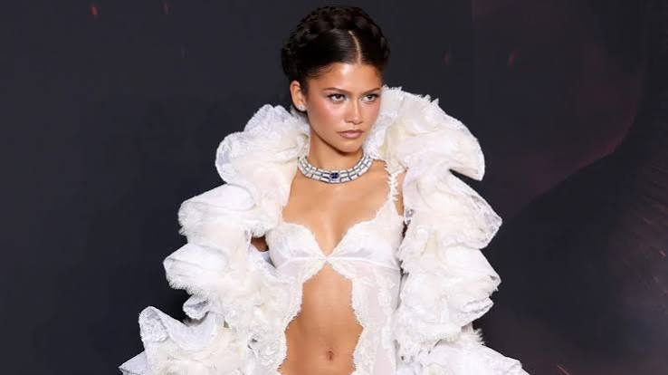 Zendaya in white lace with a necklace